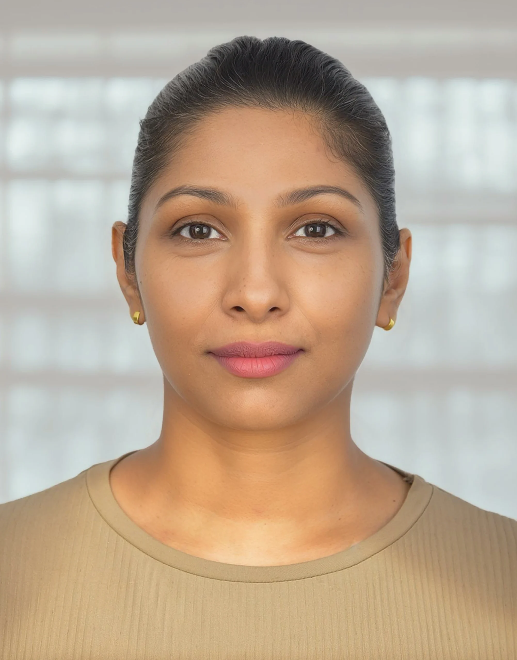 Portrait of Ishani Liyanage, Director, Corporate Governance & Business Compliance, at Ethera Business.